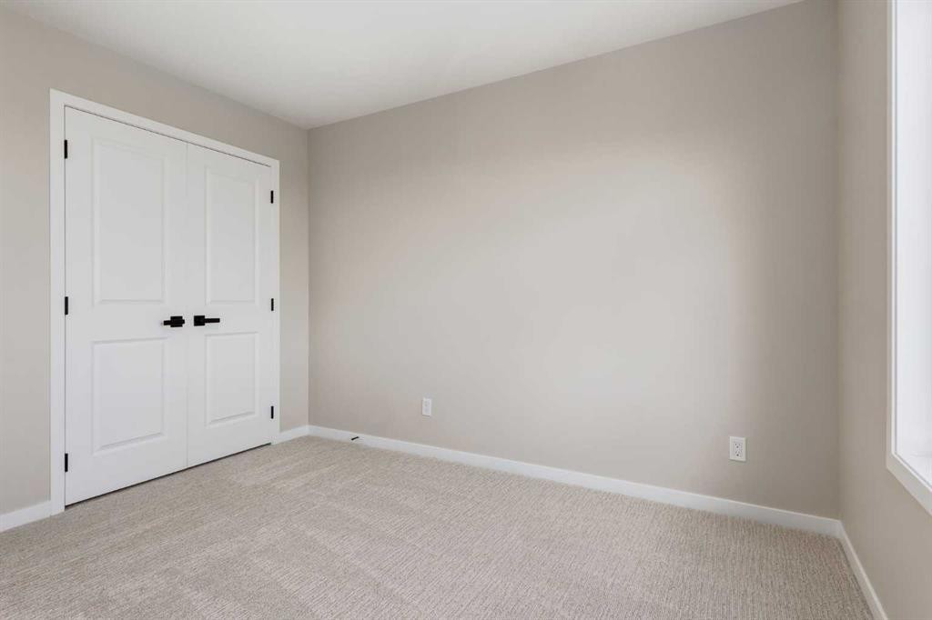 26 Alpine Gardens Sw, Calgary, AB - Indoor Photo Showing Other Room