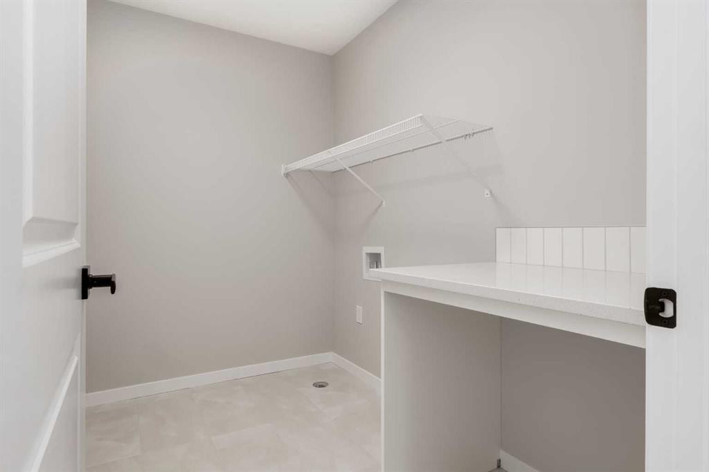 26 Alpine Gardens Sw, Calgary, AB - Indoor With Storage