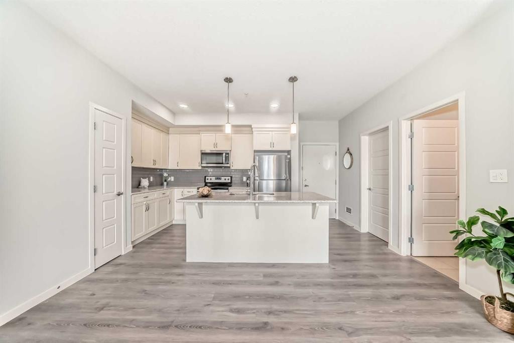 215-20 Seton Park, Calgary, AB - Indoor Photo Showing Kitchen With Double Sink With Upgraded Kitchen