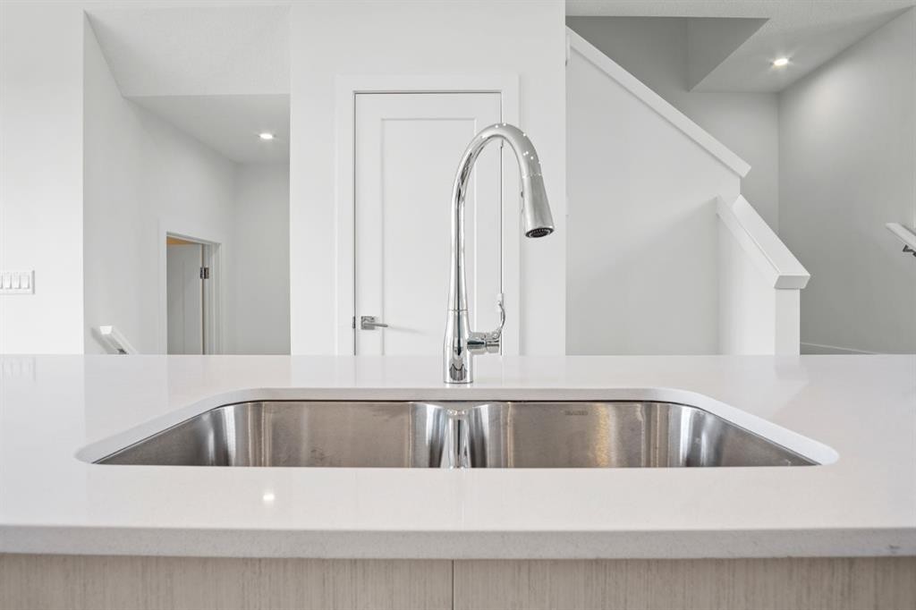 277 Dawson Way, Chestermere, AB - Indoor Photo Showing Kitchen With Double Sink