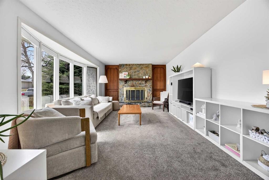 1232 40 Avenue Nw, Calgary, AB - Indoor Photo Showing Living Room With Fireplace