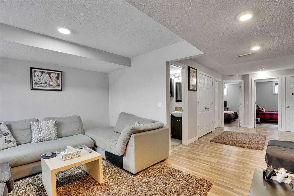 4 Martin Crossing Bay Ne, Calgary, AB - Indoor Photo Showing Living Room
