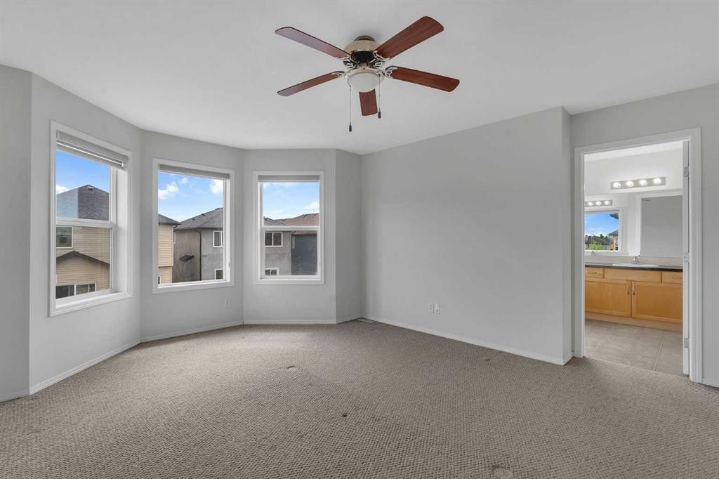 33 Saddlecrest Crescent Ne, Calgary, AB - Indoor Photo Showing Other Room