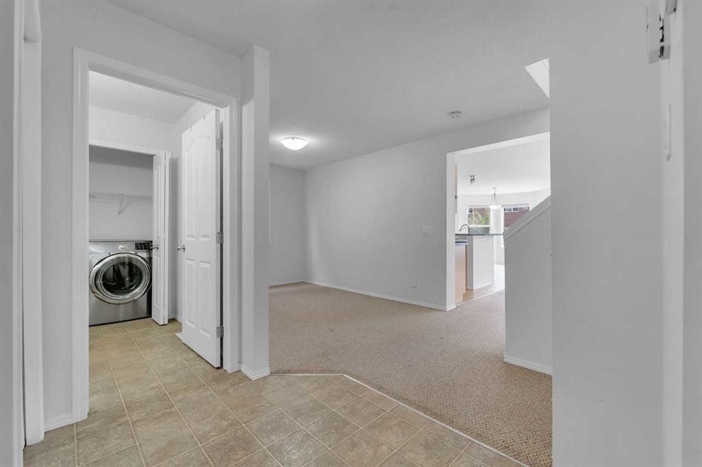 33 Saddlecrest Crescent Ne, Calgary, AB - Indoor Photo Showing Laundry Room