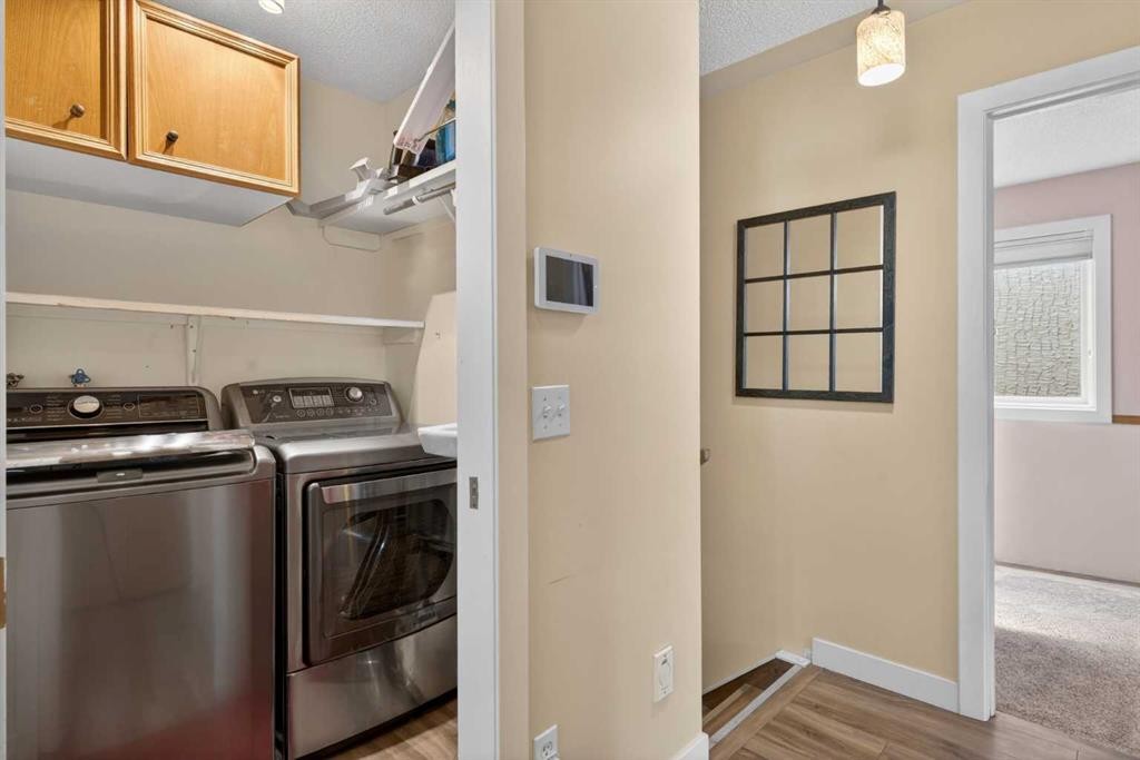 1486 Sunwood Road Se, Calgary, AB - Indoor Photo Showing Laundry Room