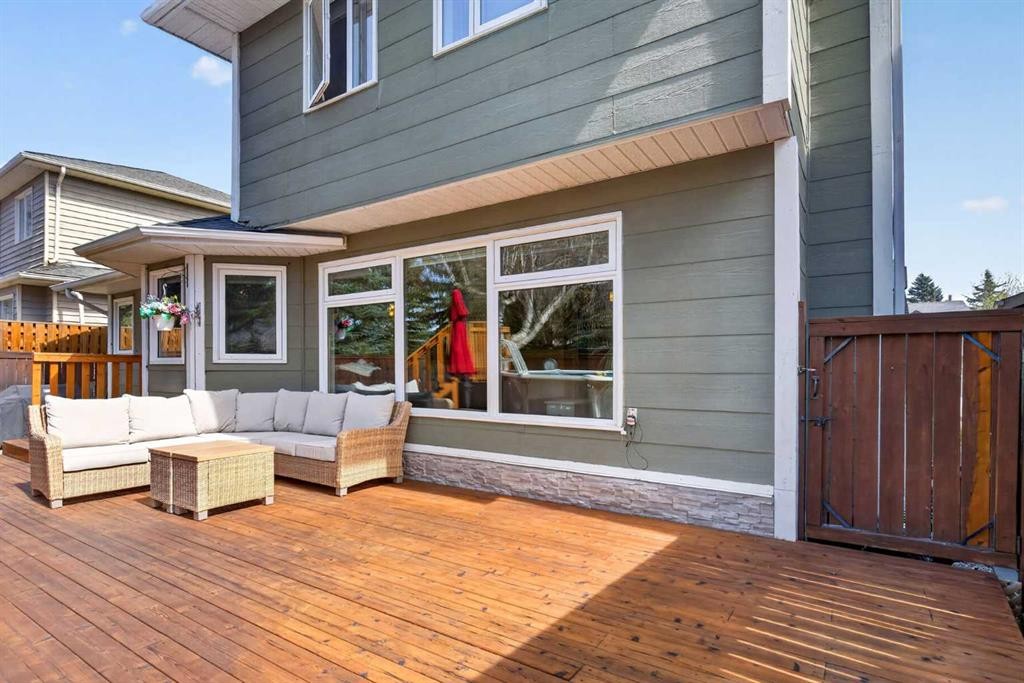 1486 Sunwood Road Se, Calgary, AB - Outdoor With Deck Patio Veranda With Exterior
