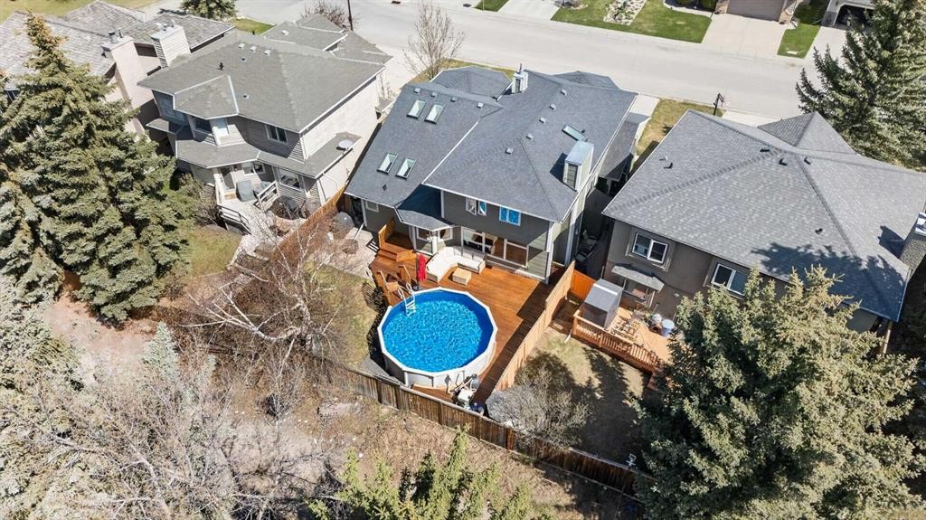 1486 Sunwood Road Se, Calgary, AB - Outdoor With Above Ground Pool With View