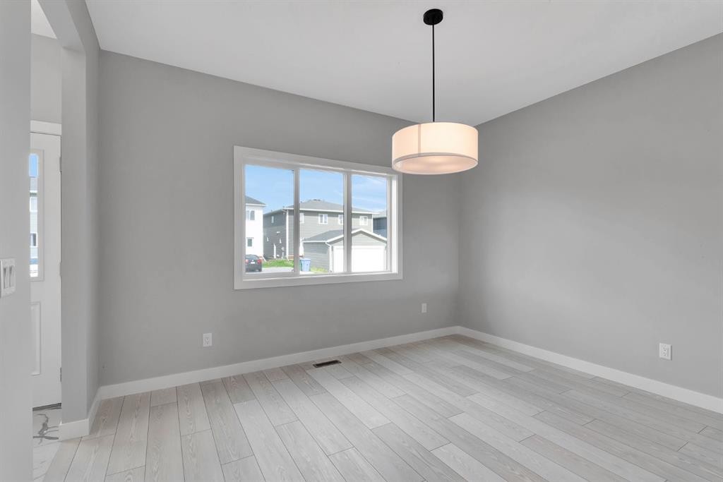 157 Dawson Wharf View, Chestermere, AB - Indoor Photo Showing Other Room