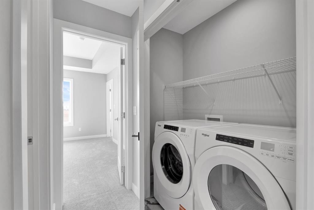 157 Dawson Wharf View, Chestermere, AB - Indoor Photo Showing Laundry Room