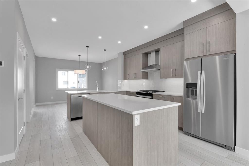 157 Dawson Wharf View, Chestermere, AB - Indoor Photo Showing Kitchen With Stainless Steel Kitchen With Upgraded Kitchen