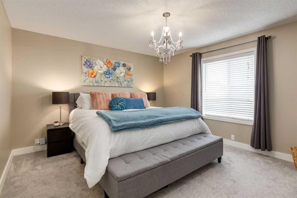 16 Prestwick Road Se, Calgary, AB - Indoor Photo Showing Bedroom