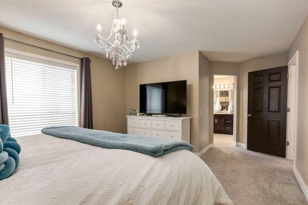 16 Prestwick Road Se, Calgary, AB - Indoor Photo Showing Bedroom