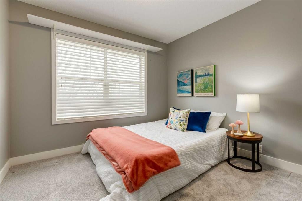 16 Prestwick Road Se, Calgary, AB - Indoor Photo Showing Bedroom