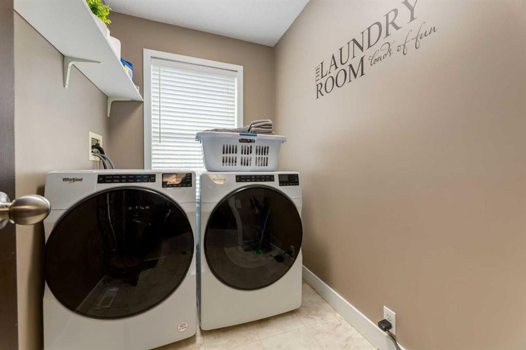 16 Prestwick Road Se, Calgary, AB - Indoor Photo Showing Laundry Room