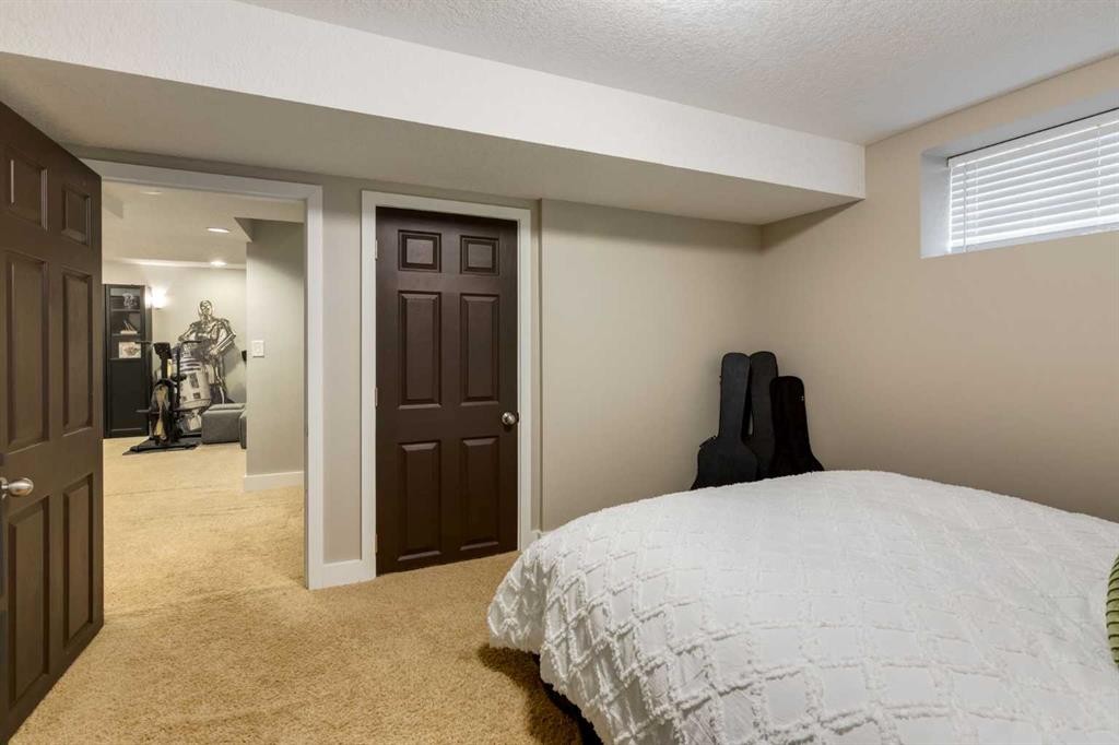 16 Prestwick Road Se, Calgary, AB - Indoor Photo Showing Bedroom