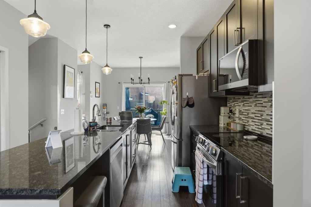 227 Copperpond Row Se, Calgary, AB - Indoor Photo Showing Kitchen With Upgraded Kitchen