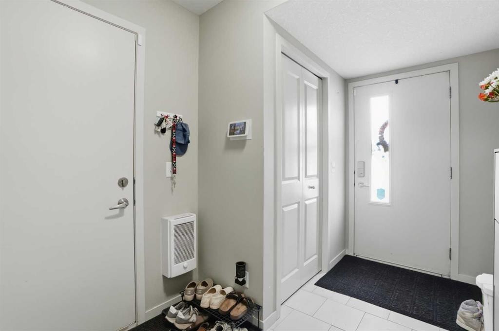 227 Copperpond Row Se, Calgary, AB - Indoor Photo Showing Other Room