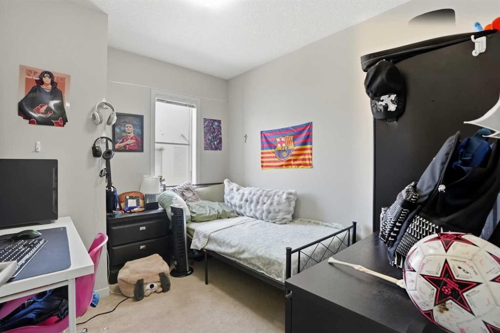 227 Copperpond Row Se, Calgary, AB - Indoor Photo Showing Bedroom