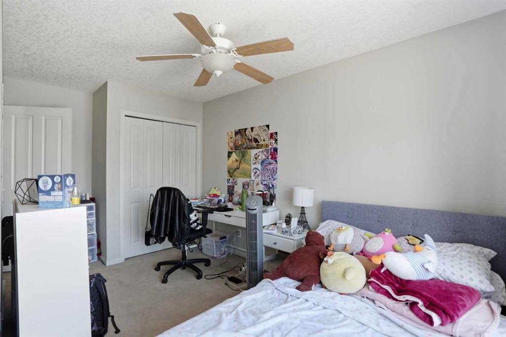 227 Copperpond Row Se, Calgary, AB - Indoor Photo Showing Bedroom