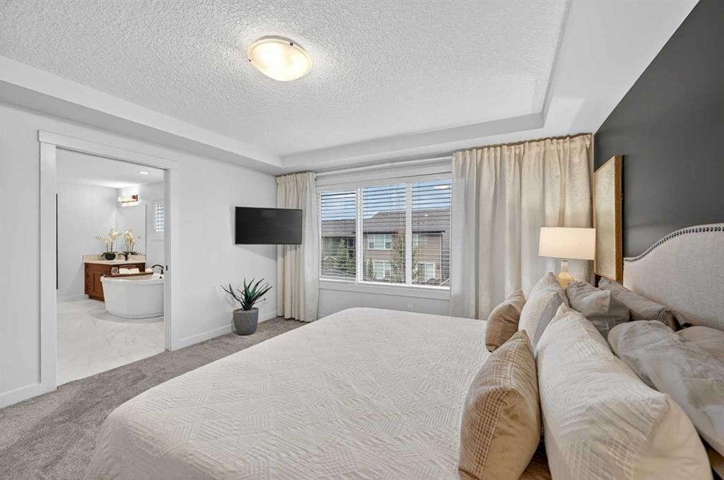 19 Cranbrook Crescent Se, Calgary, AB - Indoor Photo Showing Bedroom