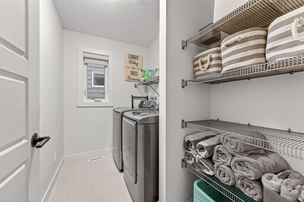 19 Cranbrook Crescent Se, Calgary, AB - Indoor Photo Showing Laundry Room
