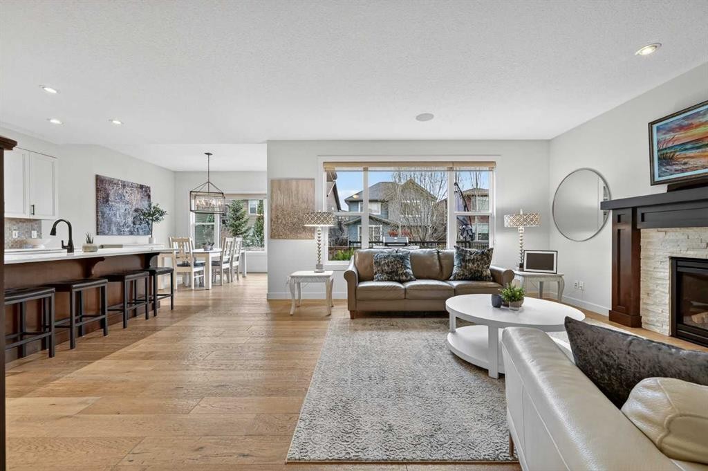 19 Cranbrook Crescent Se, Calgary, AB - Indoor Photo Showing Living Room With Fireplace