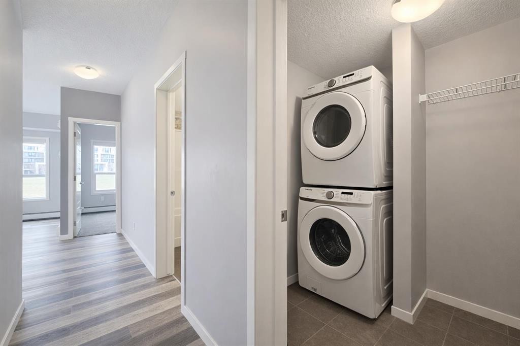 109-4150 Seton Drive Se, Calgary, AB - Indoor Photo Showing Laundry Room