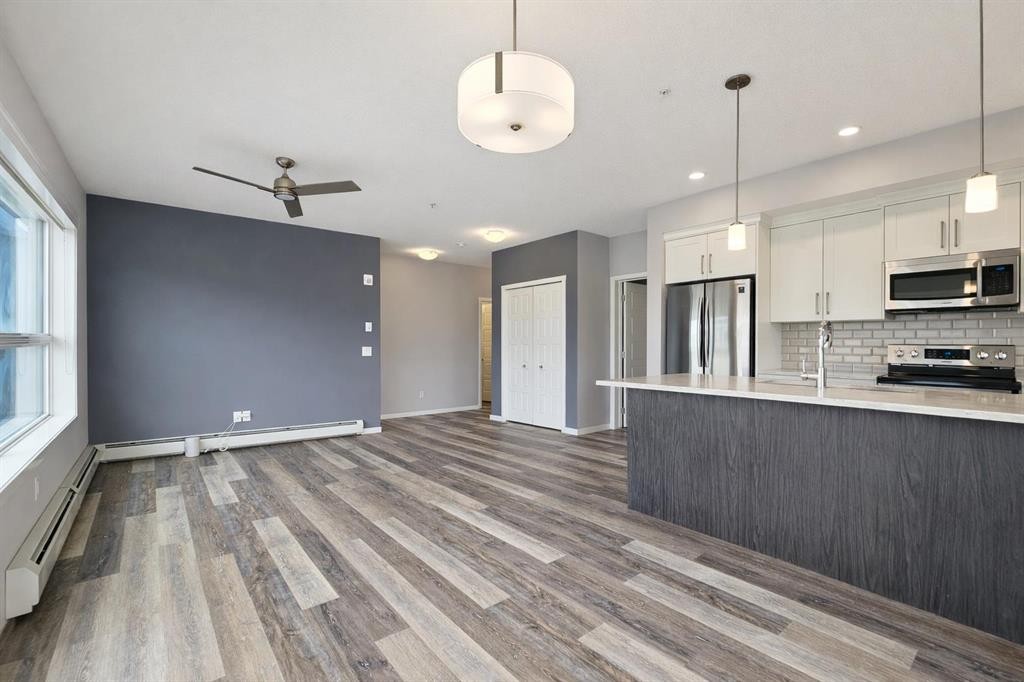 109-4150 Seton Drive Se, Calgary, AB - Indoor Photo Showing Kitchen With Upgraded Kitchen