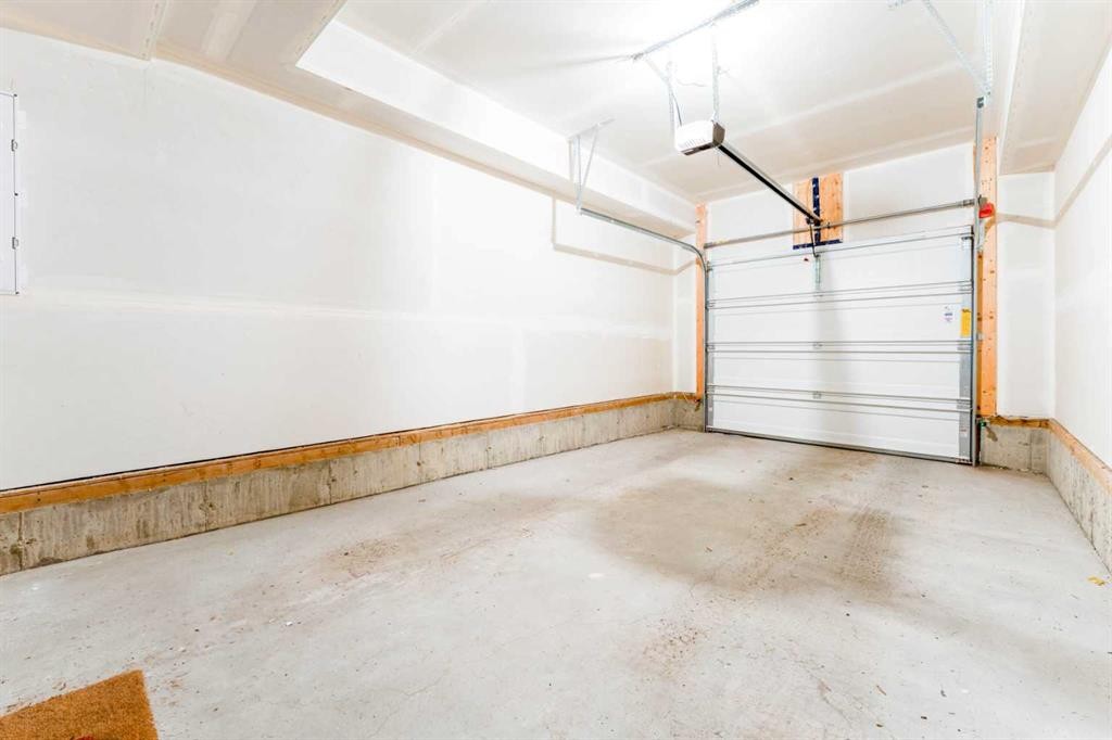 120 Spring Creek Common Sw, Calgary, AB - Indoor Photo Showing Garage