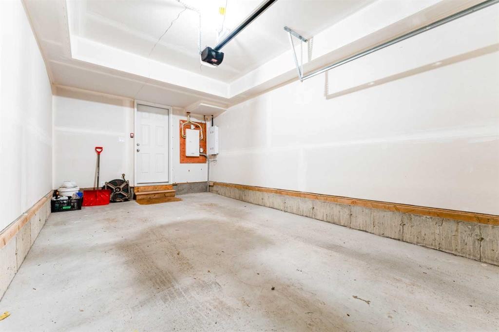 120 Spring Creek Common Sw, Calgary, AB - Indoor Photo Showing Garage