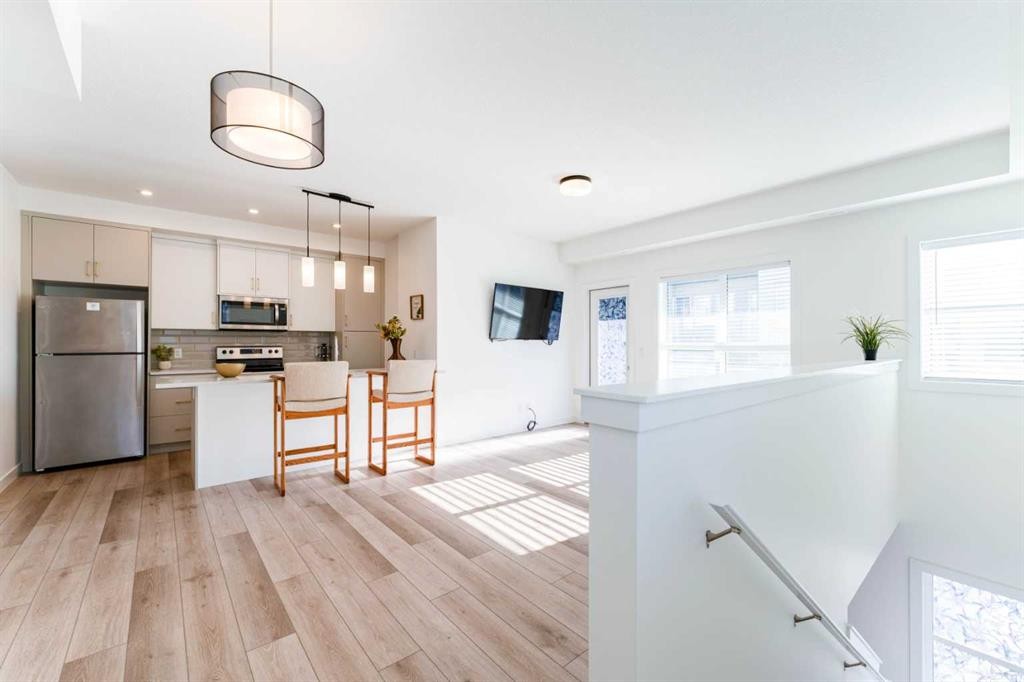 120 Spring Creek Common Sw, Calgary, AB - Indoor Photo Showing Kitchen With Stainless Steel Kitchen