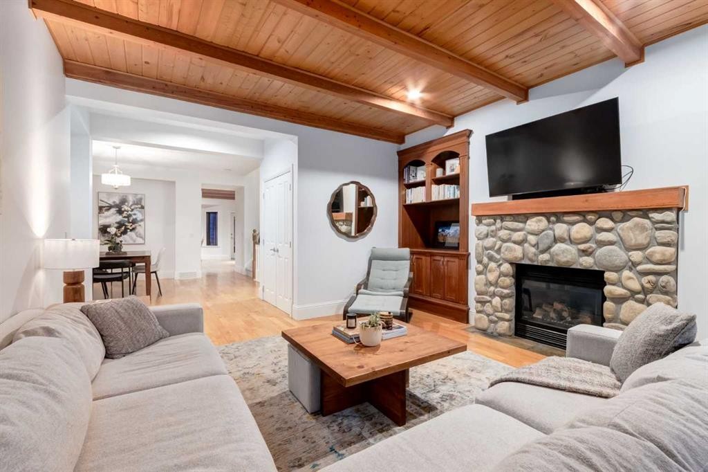2021 32 Avenue Sw, Calgary, AB - Indoor Photo Showing Living Room With Fireplace