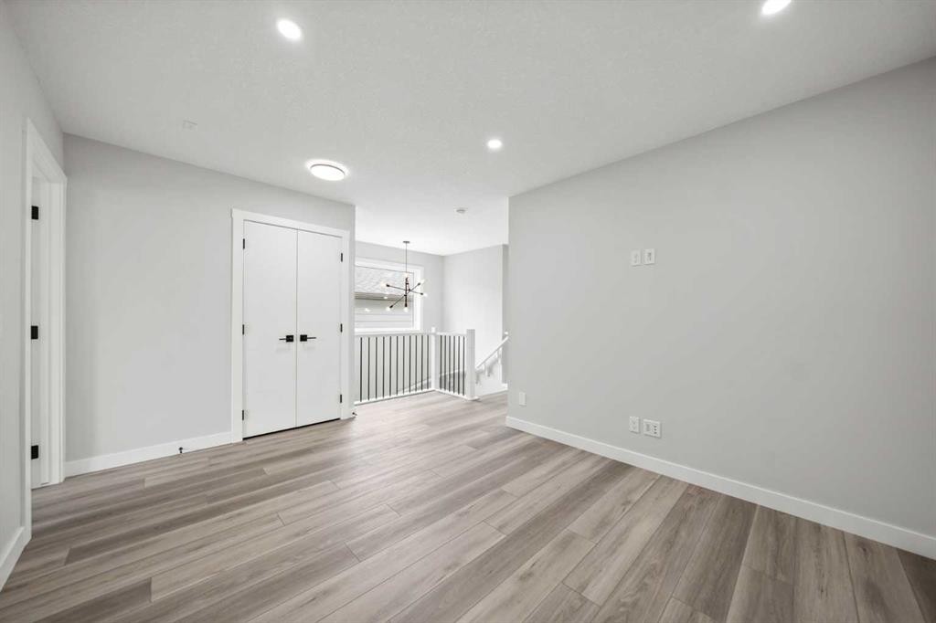 46 Versant View Sw, Calgary, AB - Indoor Photo Showing Other Room