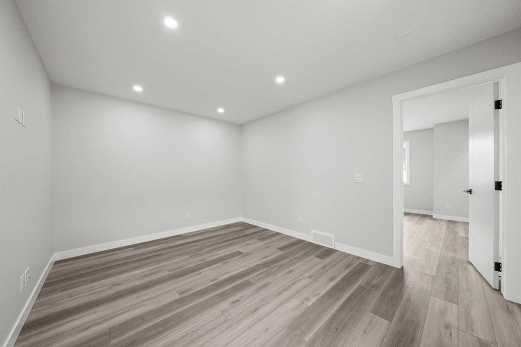 46 Versant View Sw, Calgary, AB - Indoor Photo Showing Other Room