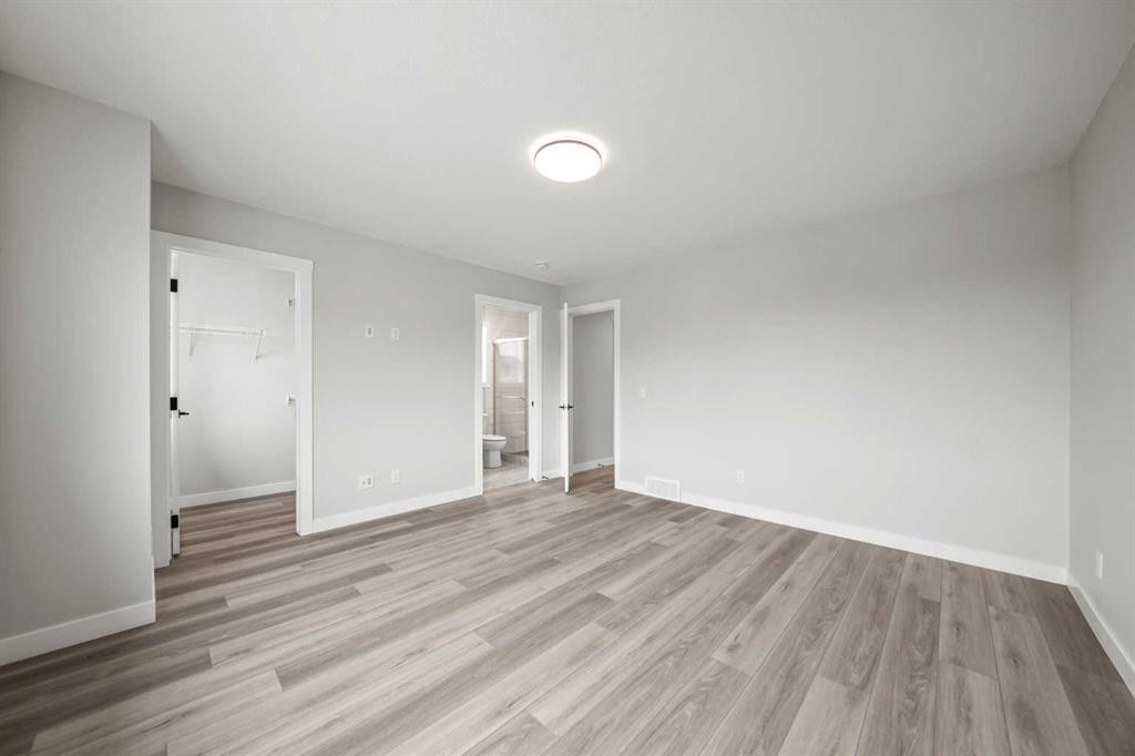 46 Versant View Sw, Calgary, AB - Indoor Photo Showing Other Room