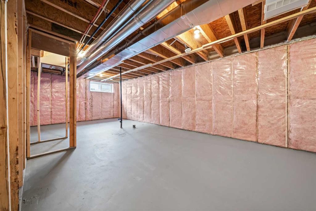 46 Versant View Sw, Calgary, AB - Indoor Photo Showing Basement