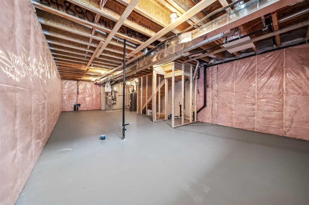46 Versant View Sw, Calgary, AB - Indoor Photo Showing Basement