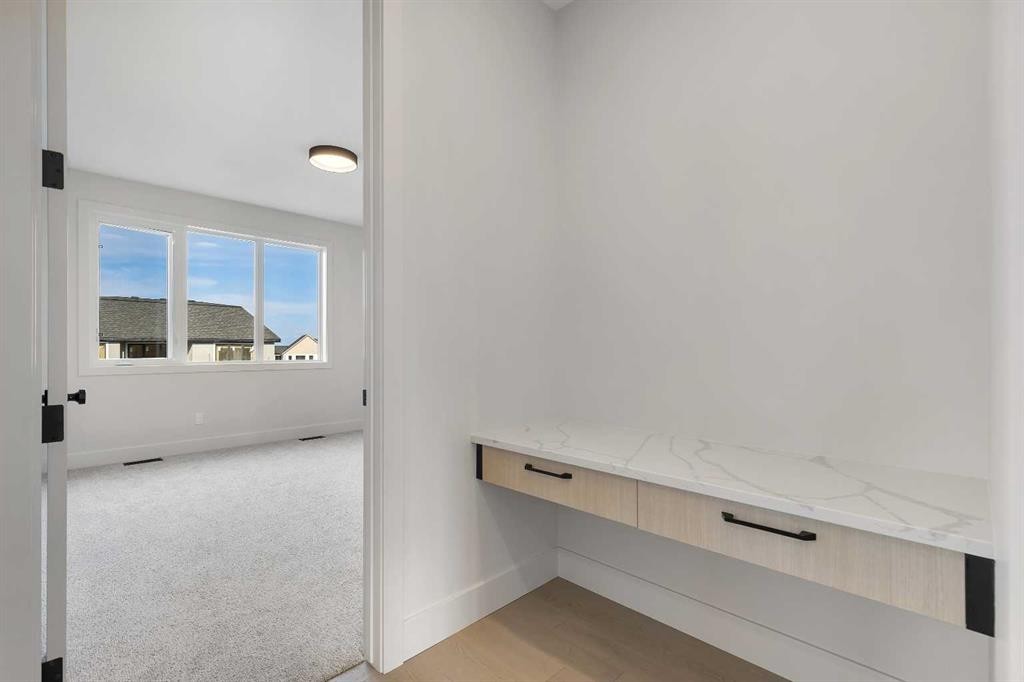 336 Normandy Drive Sw, Calgary, AB - Indoor Photo Showing Other Room