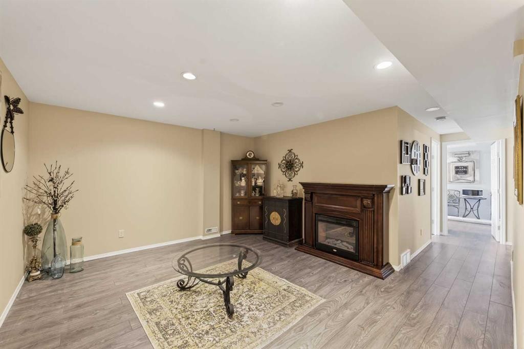 24 Deer Ridge Close Se, Calgary, AB - Indoor With Fireplace