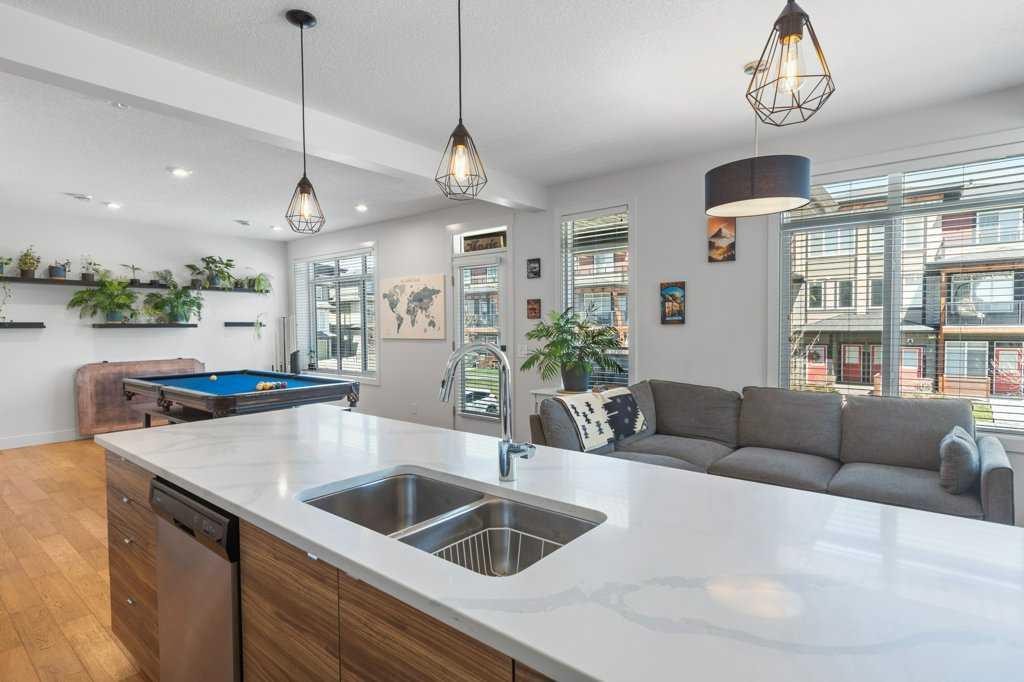 222 Seton Passage Se, Calgary, AB - Indoor Photo Showing Kitchen With Double Sink