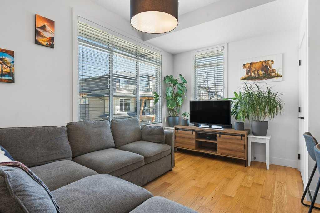 222 Seton Passage Se, Calgary, AB - Indoor Photo Showing Living Room