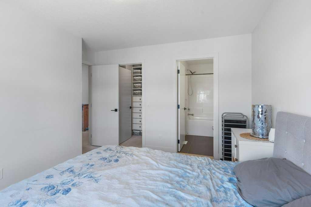 222 Seton Passage Se, Calgary, AB - Indoor Photo Showing Bedroom