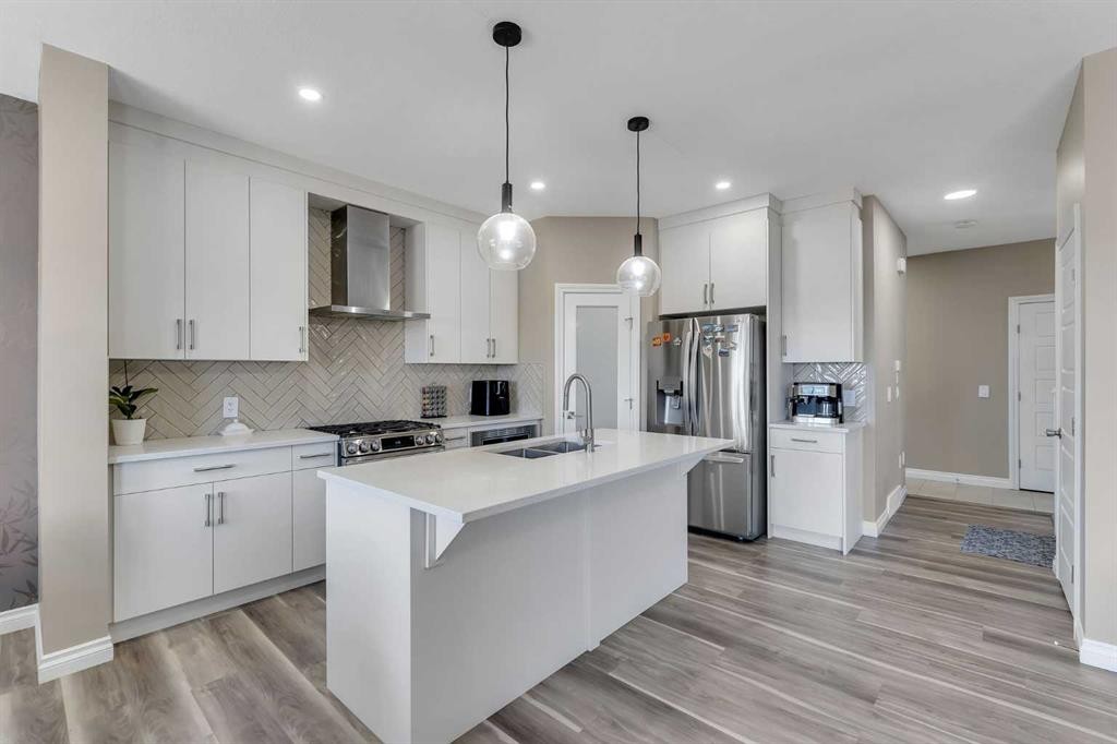 521 Corner Meadows Way Ne, Calgary, AB - Indoor Photo Showing Kitchen With Stainless Steel Kitchen With Double Sink With Upgraded Kitchen