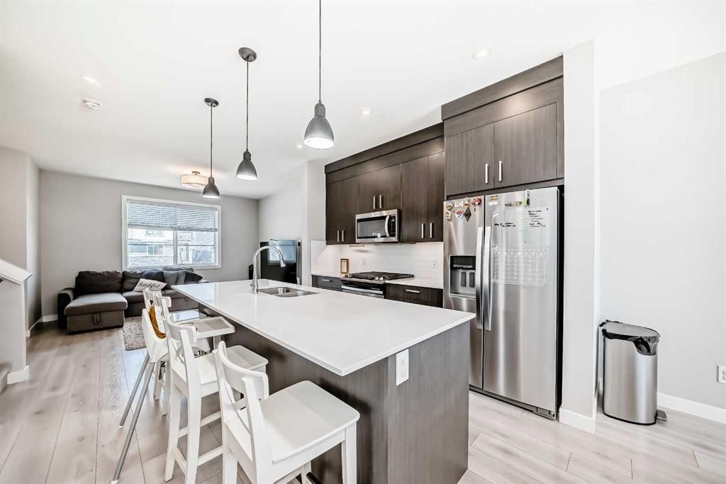 120 Chelsea Drive, Chestermere, AB - Indoor Photo Showing Kitchen With Stainless Steel Kitchen With Double Sink With Upgraded Kitchen