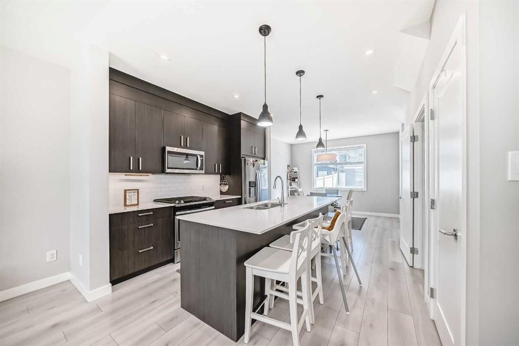 120 Chelsea Drive, Chestermere, AB - Indoor Photo Showing Kitchen With Stainless Steel Kitchen With Upgraded Kitchen