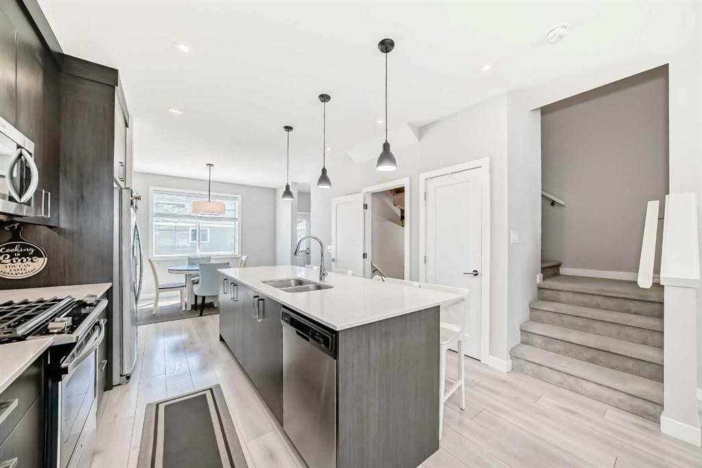 120 Chelsea Drive, Chestermere, AB - Indoor Photo Showing Kitchen With Stainless Steel Kitchen With Double Sink With Upgraded Kitchen