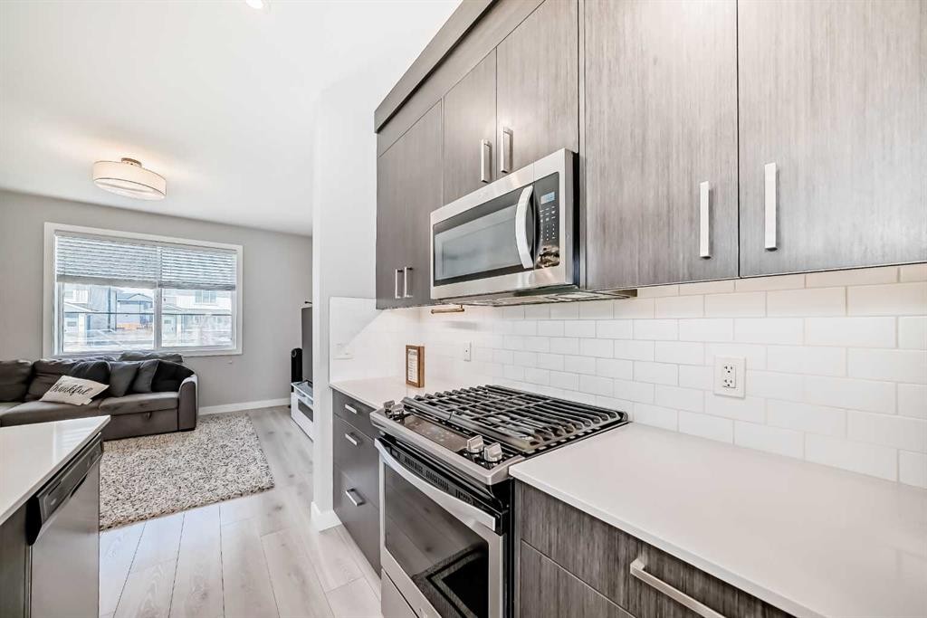 120 Chelsea Drive, Chestermere, AB - Indoor Photo Showing Kitchen With Upgraded Kitchen
