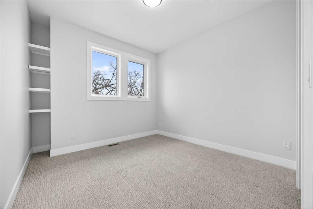 107 Hartford Road Nw, Calgary, AB - Indoor Photo Showing Other Room