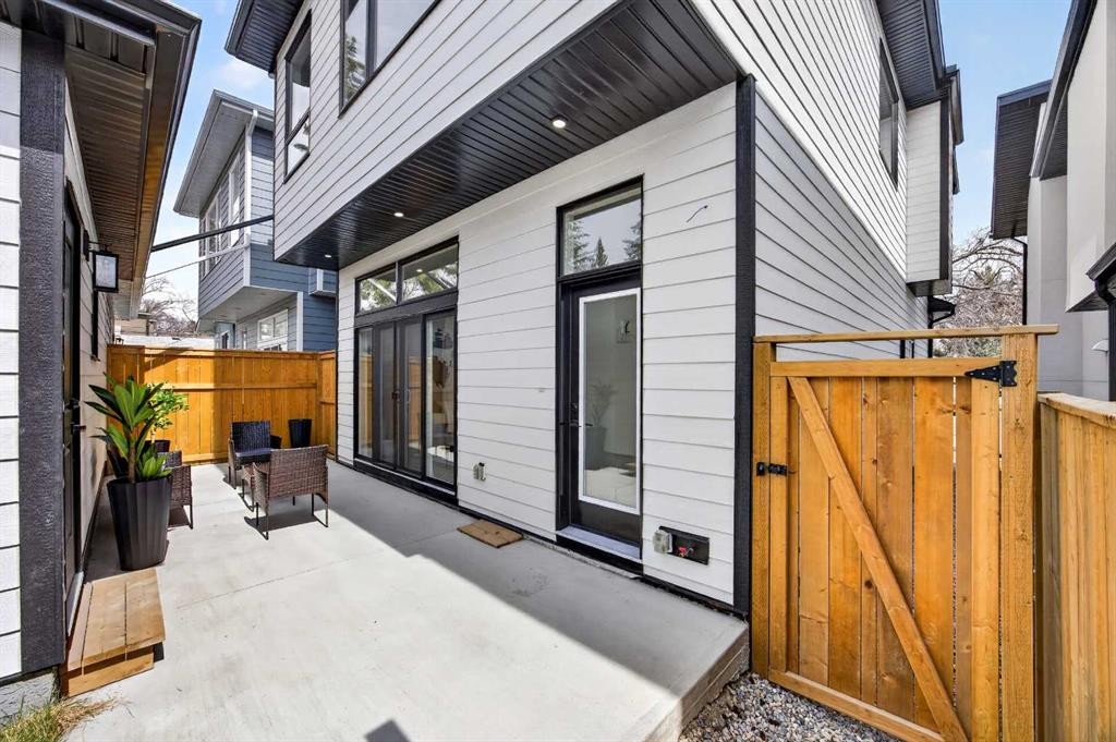 107 Hartford Road Nw, Calgary, AB - Outdoor With Deck Patio Veranda With Exterior
