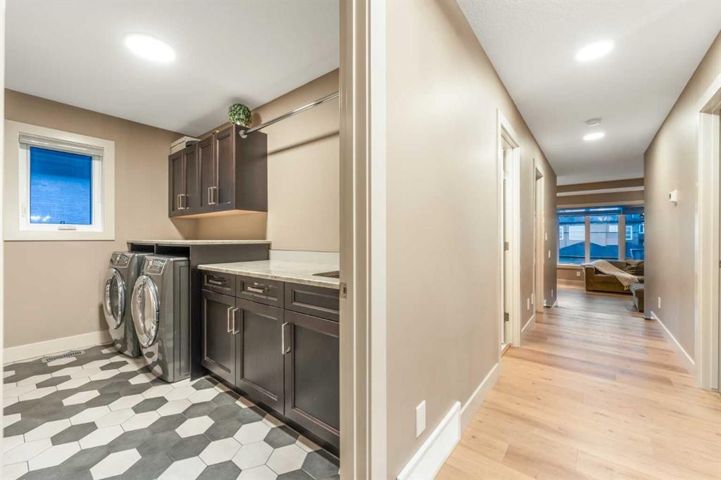 105 Carringvue Manor Nw, Calgary, AB - Indoor Photo Showing Laundry Room